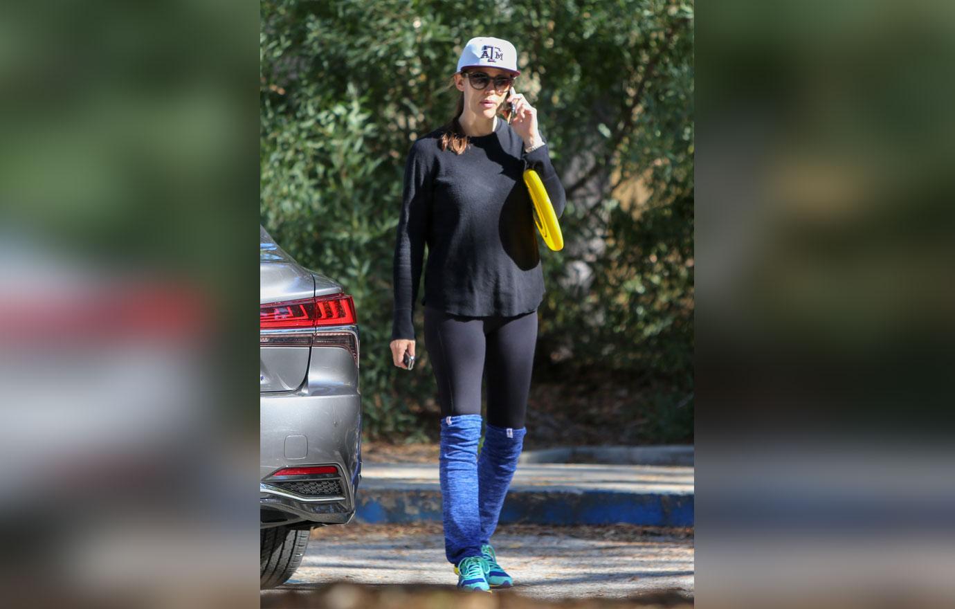 Jennifer Garner gives her son Samuel a piggyback ride after picking him up  from school in Brentwood