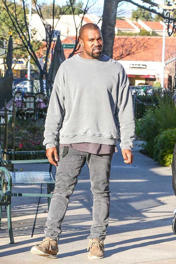 //kanye west caught checking out womans butt​