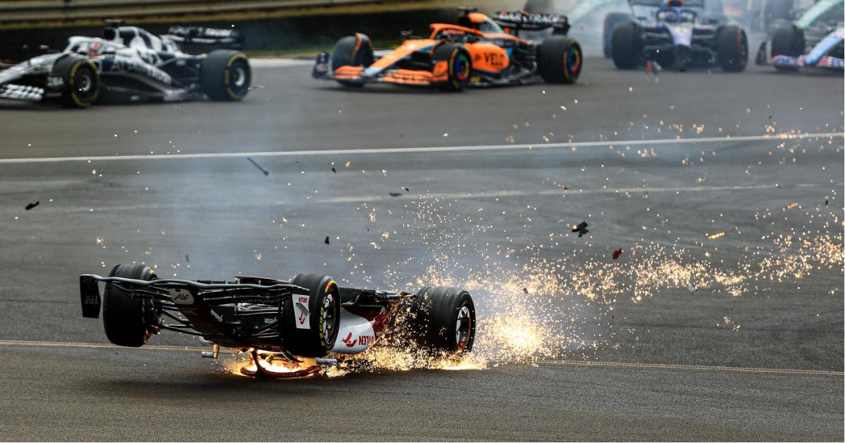 zhou guanyu flips skids  meters crash british grand prix