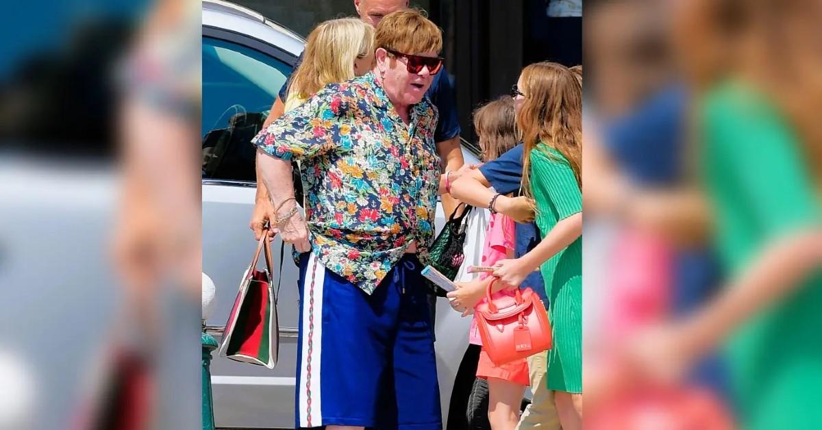 elton john accused peeing plastic bottle shoe shop france