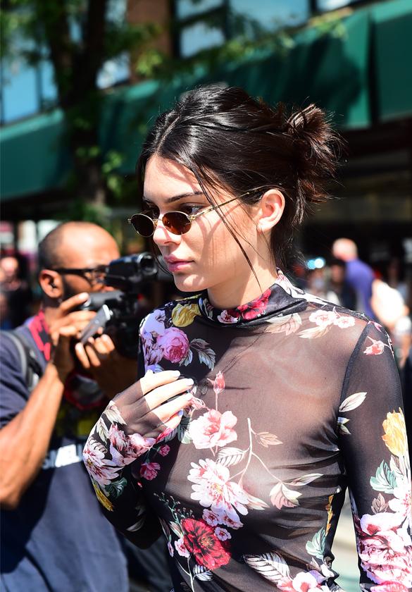 Kendall Jenner goes braless and flashes nipples while outside B&H photo and Video Store on 34street in Midtown