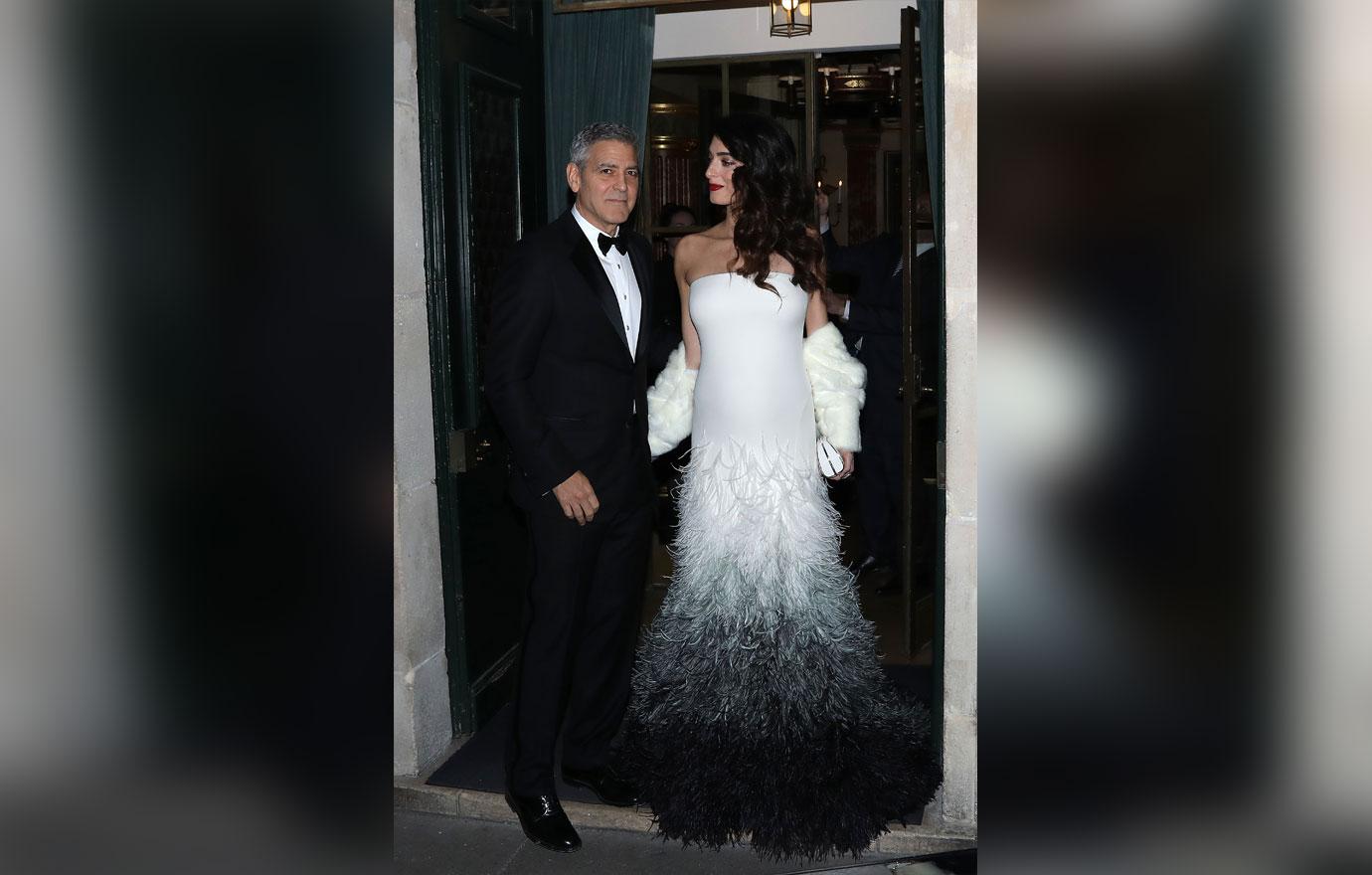 //amal clooney pregnant twins paris fashion week george clooney