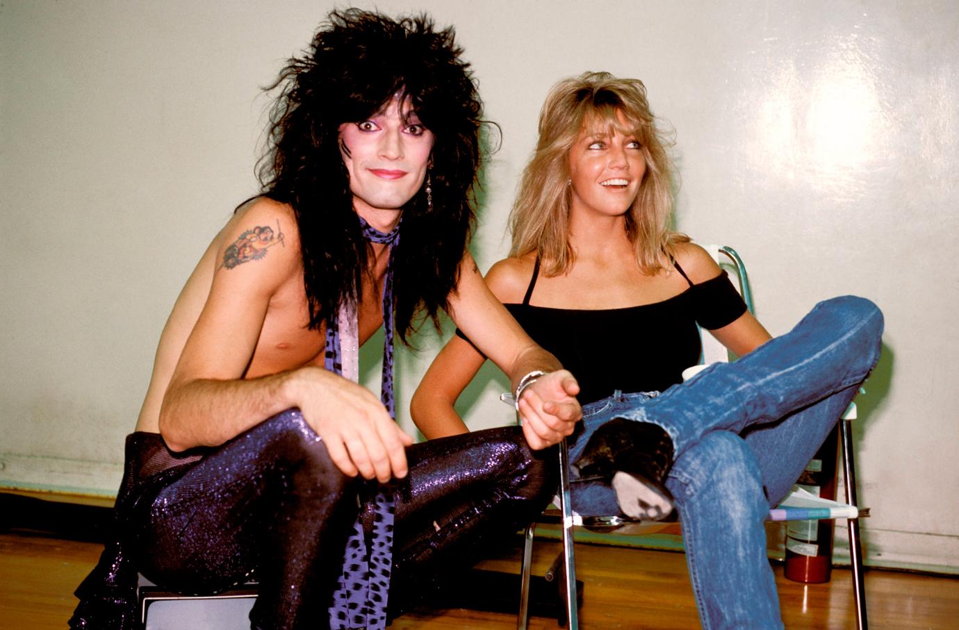 Tommy Lee of Motley Crue poses backstage with wife Heather Locklear.