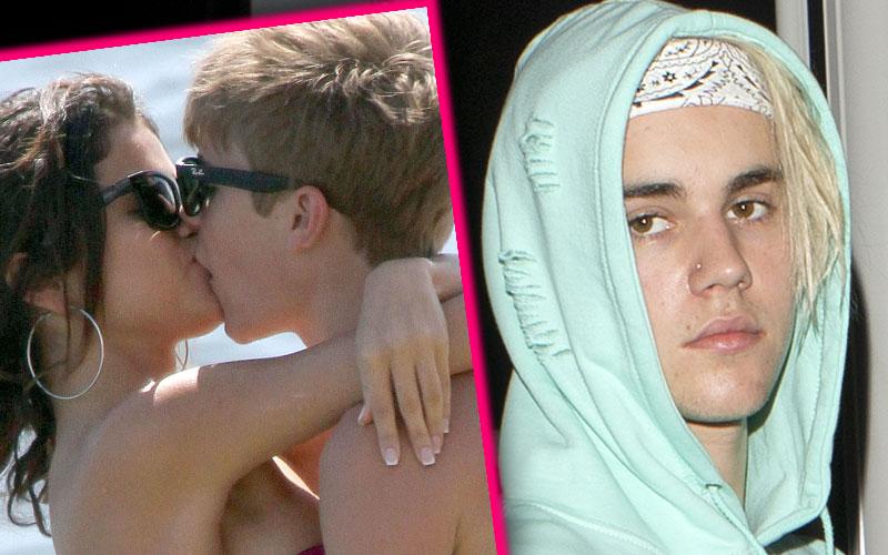 selena gomez kissing justin bieber on the lips in bed