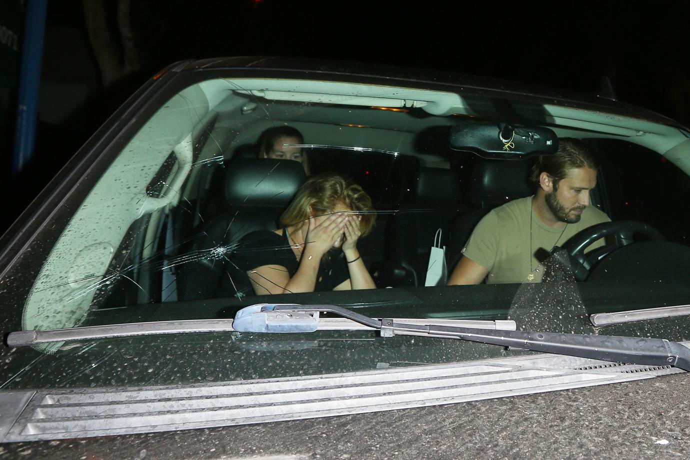 Hayden Panettiere Shields Her Face As She Gets In A Car With A Broken Wind Shield With Boyfriend Brian Hickerson