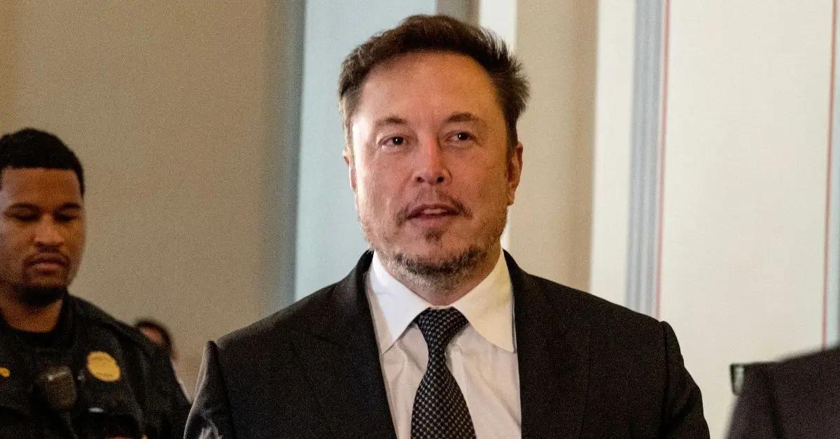 elon musk walking into meeting