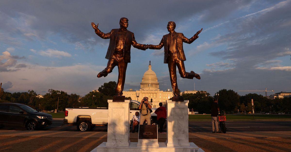 Photo of Donald Trump, Jeffrey Epstein statue