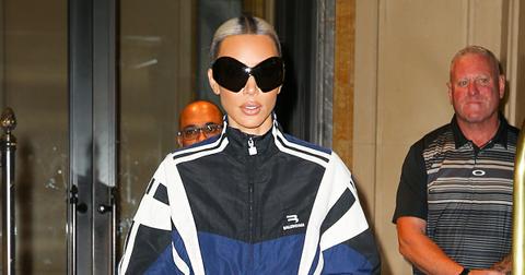 kanye west covers balenciaga logo boots kim kardashian