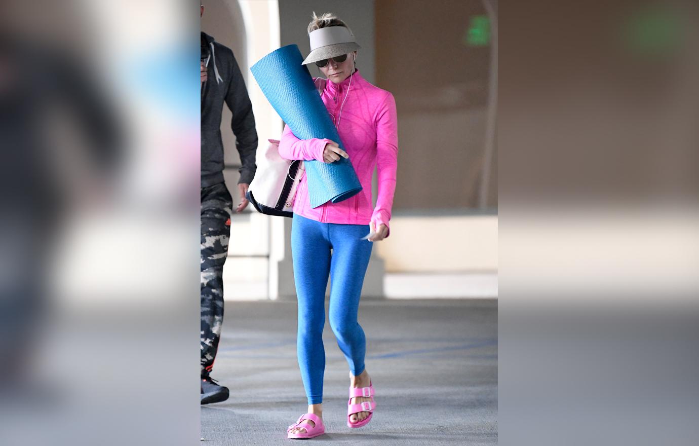 Lori Loughlin Heads To Yoga as Felicity Huffman Heads to Jail