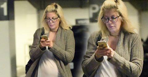 tori spelling pregnant baby bump sheer shirt