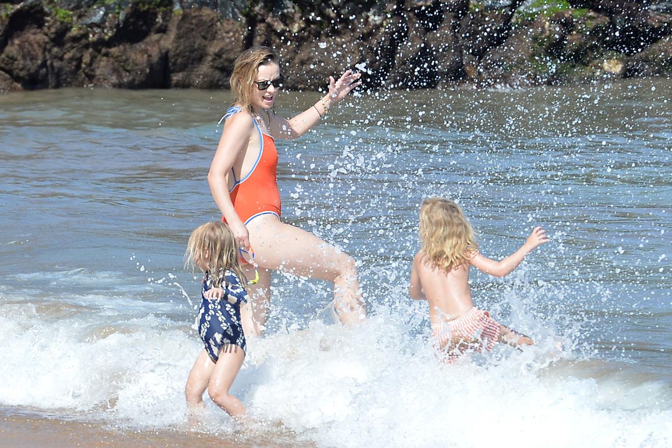 Olivia Wilde Wears Orange Swimsuit During Beach Day With Kids