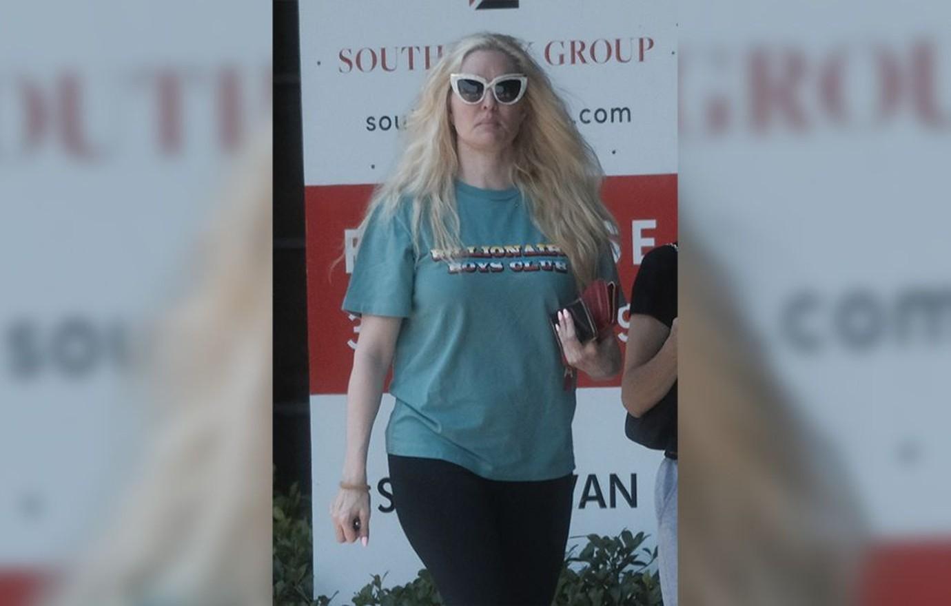 Erika Jayne Looks Worse For Wear Picking Up Toilet Paper As ...