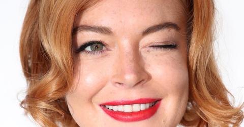 Lindsay Lohan gives the camera a wink in a closeup shot.