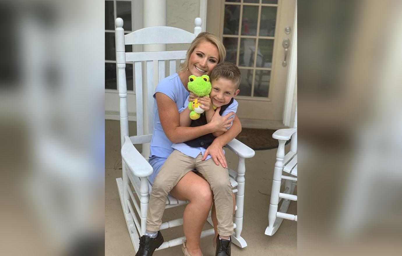 Olivia Leedham holds her child, Kaden.