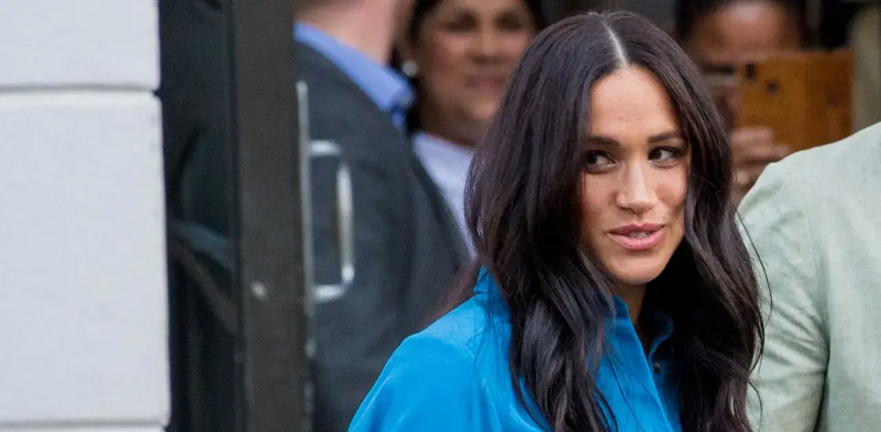 Meghan has told friends she's 'convinced' Buckingham Palace loyalists are 'pulling strings.'