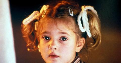 Drew Barrymore marveled at her alien friend in a scene from the classic film, E.T.