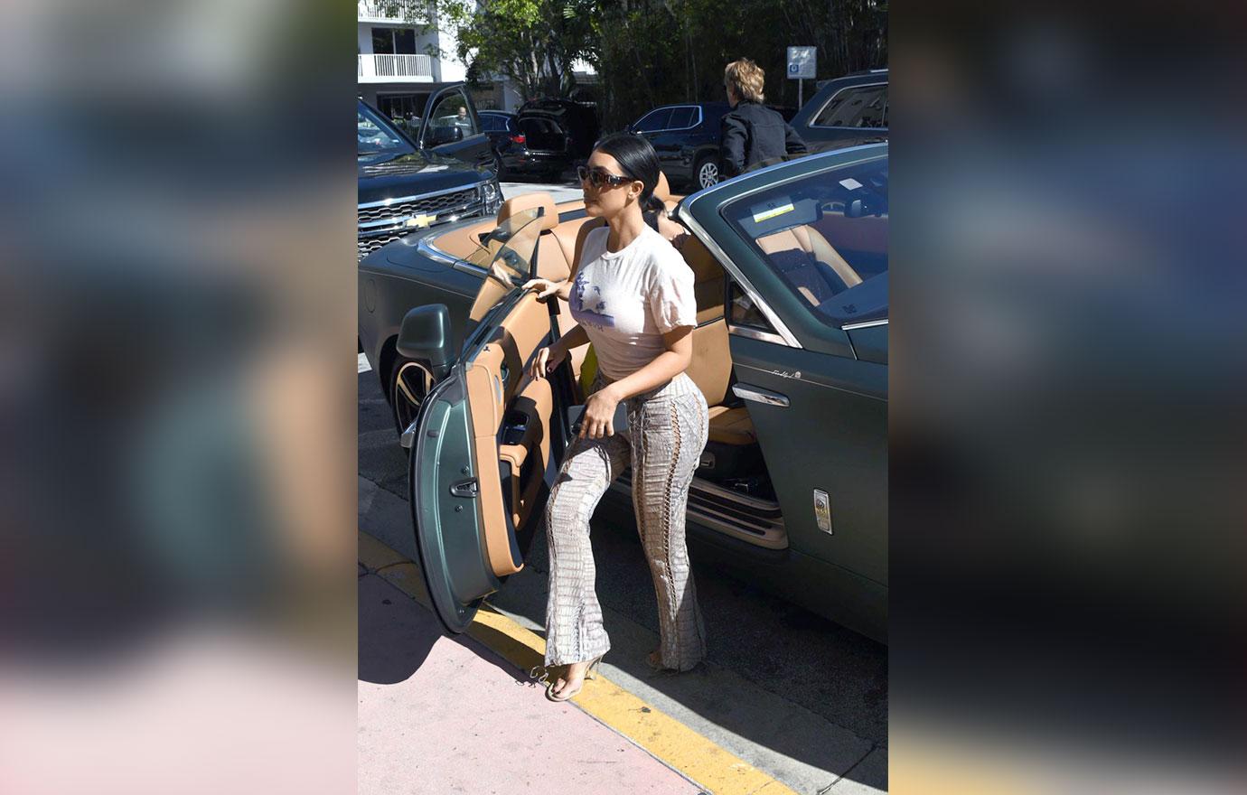 Kim and Kourtney Kardashian out in Miami in a green Rolls Royce with Jonathan Cheban