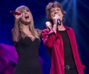 //mick jagger gets close hot young pop stars