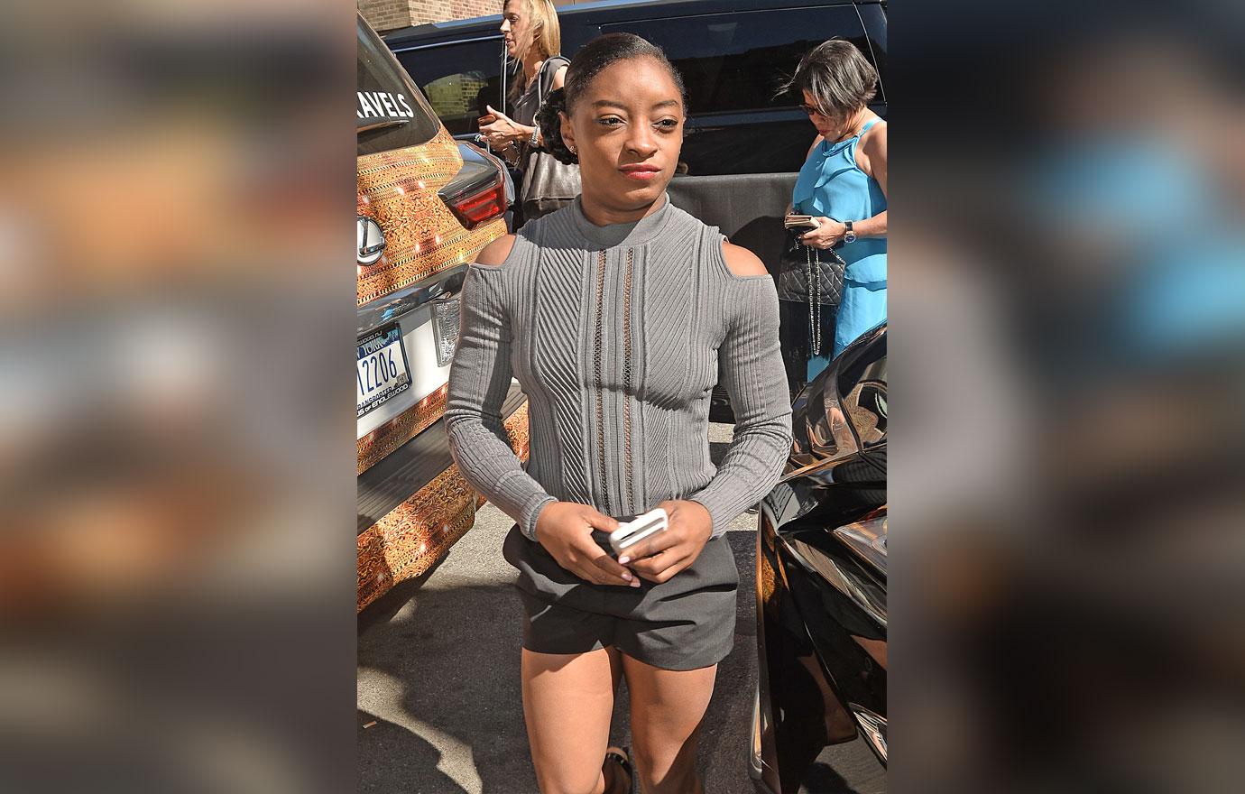 simone biles troubled childhood dad evicted sister car accident dwts