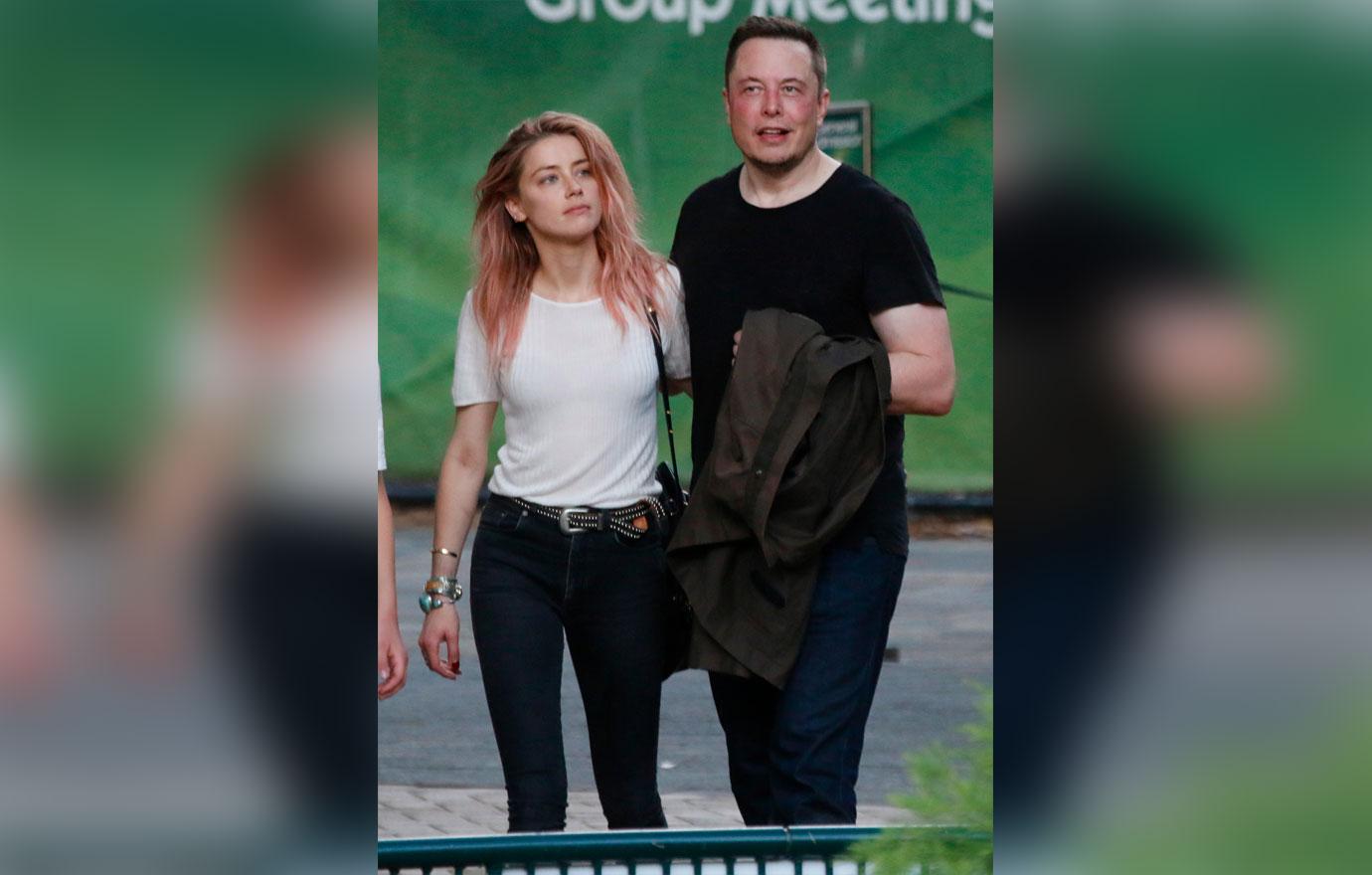 //amber heard elon musk dating holding hands