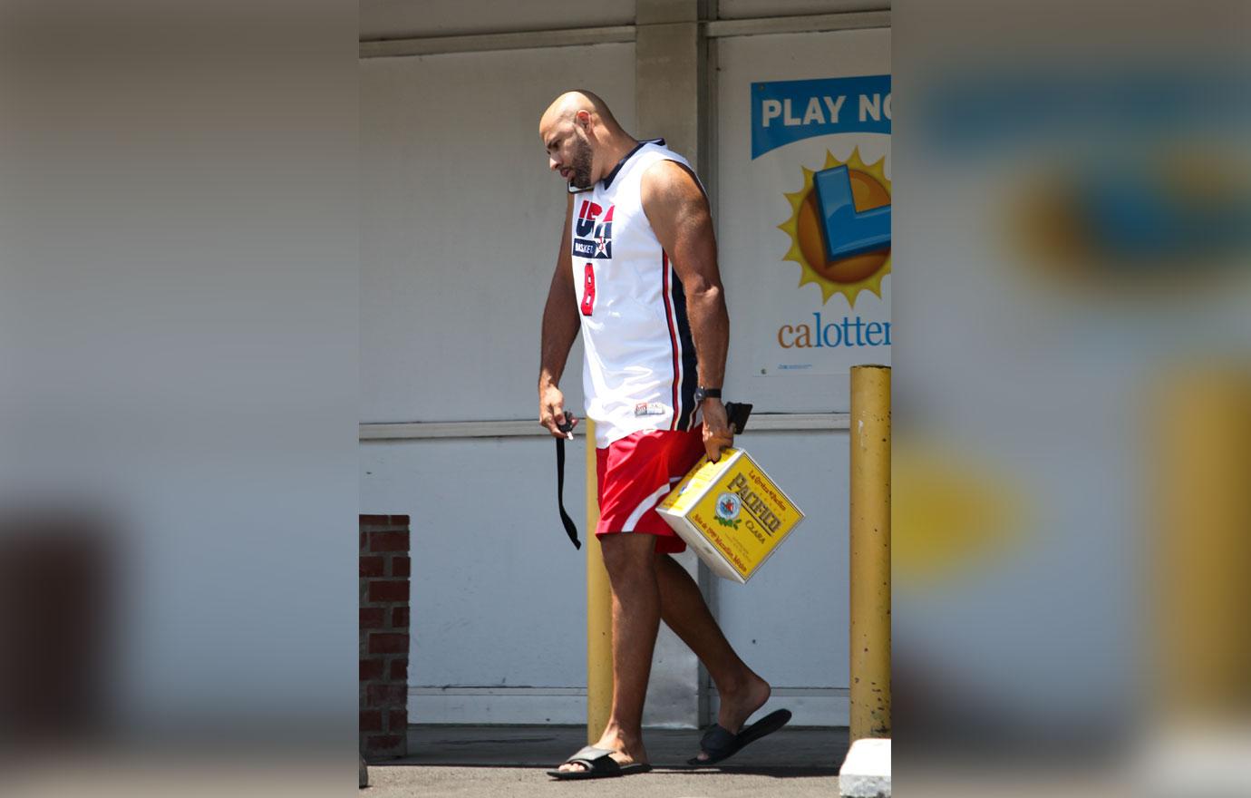 //Hank Baskett Buying Booze Divorce