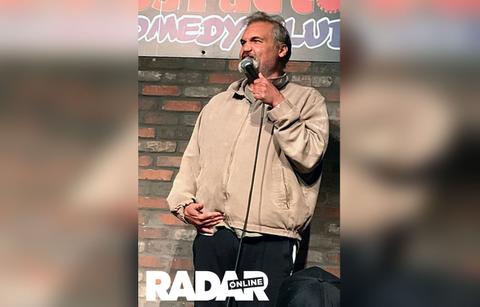 Arrtie Lange Performing On STage At Stress Factory Comedy Club