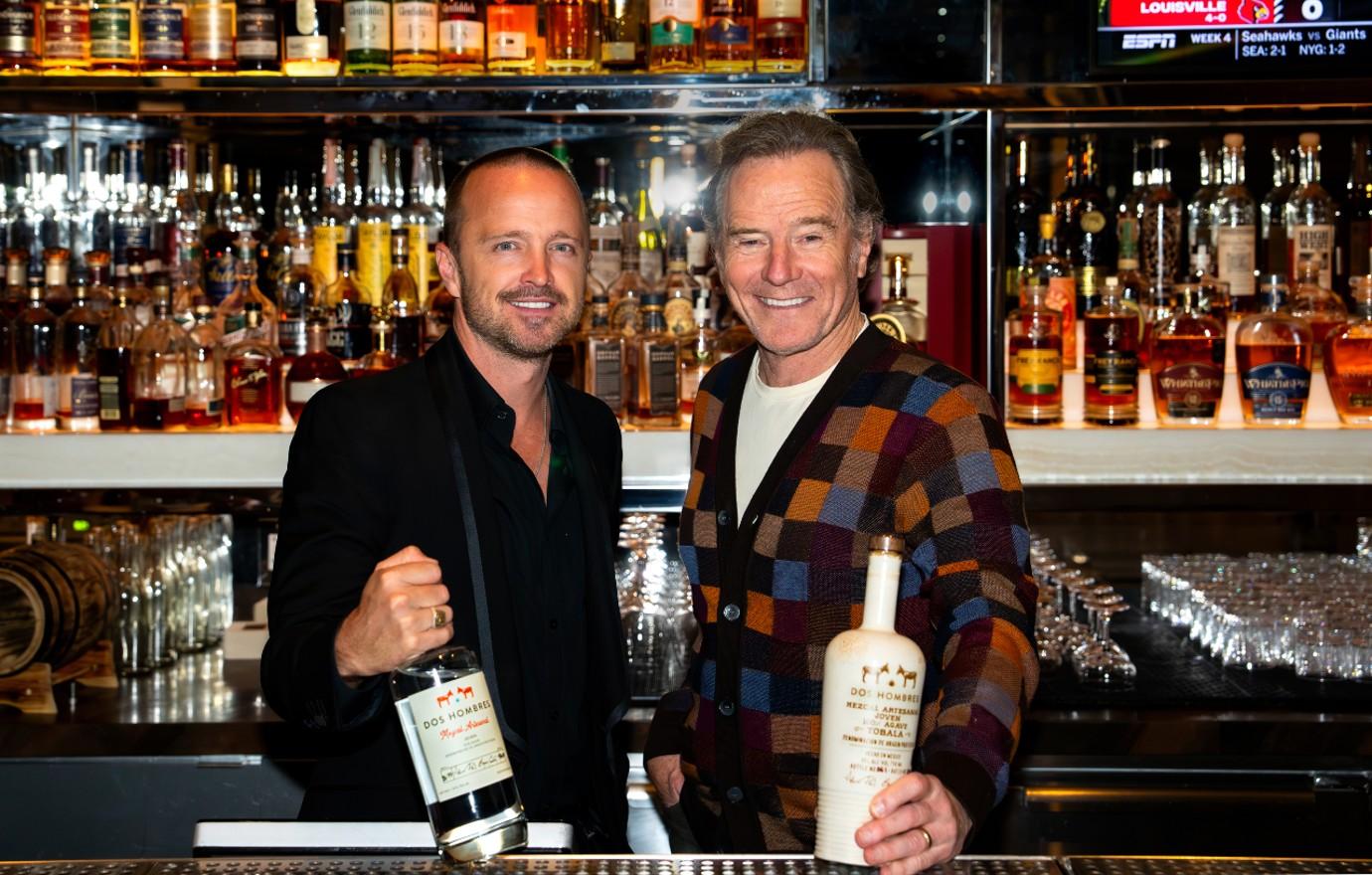 aaron paul and bryan cranston behind the bar at cut at the venetian resort las vegas