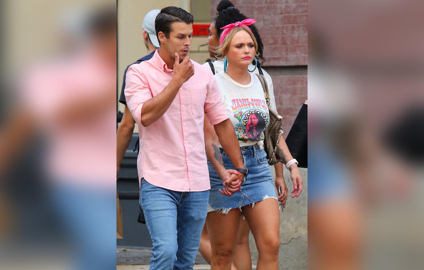 Miranda Lambert and Husband Brendan McLoughlin Seen Walking Holding Hands Outside In Matching Pink and Denim Outfits