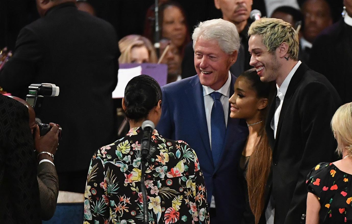 Former US President Bill Clinton took a picture with singer Ariana Grande and her fiancee Pete Davidson at Aretha Franklin's funeral at Greater Grace Temple on August 31, 2018 in Detroit, Michigan.