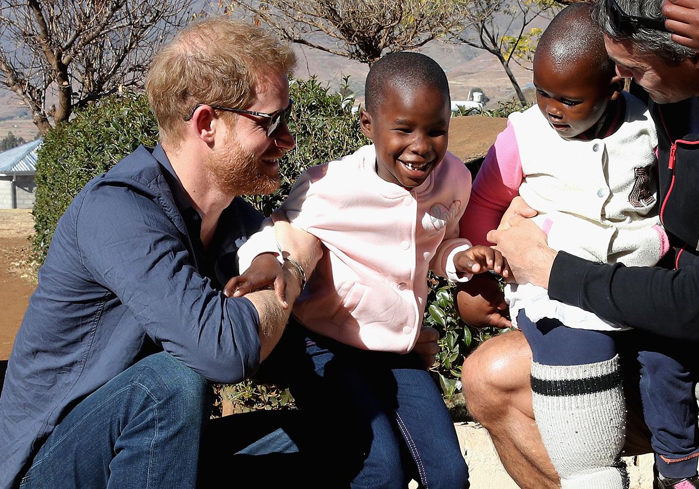 Prince Harry Plays With Children