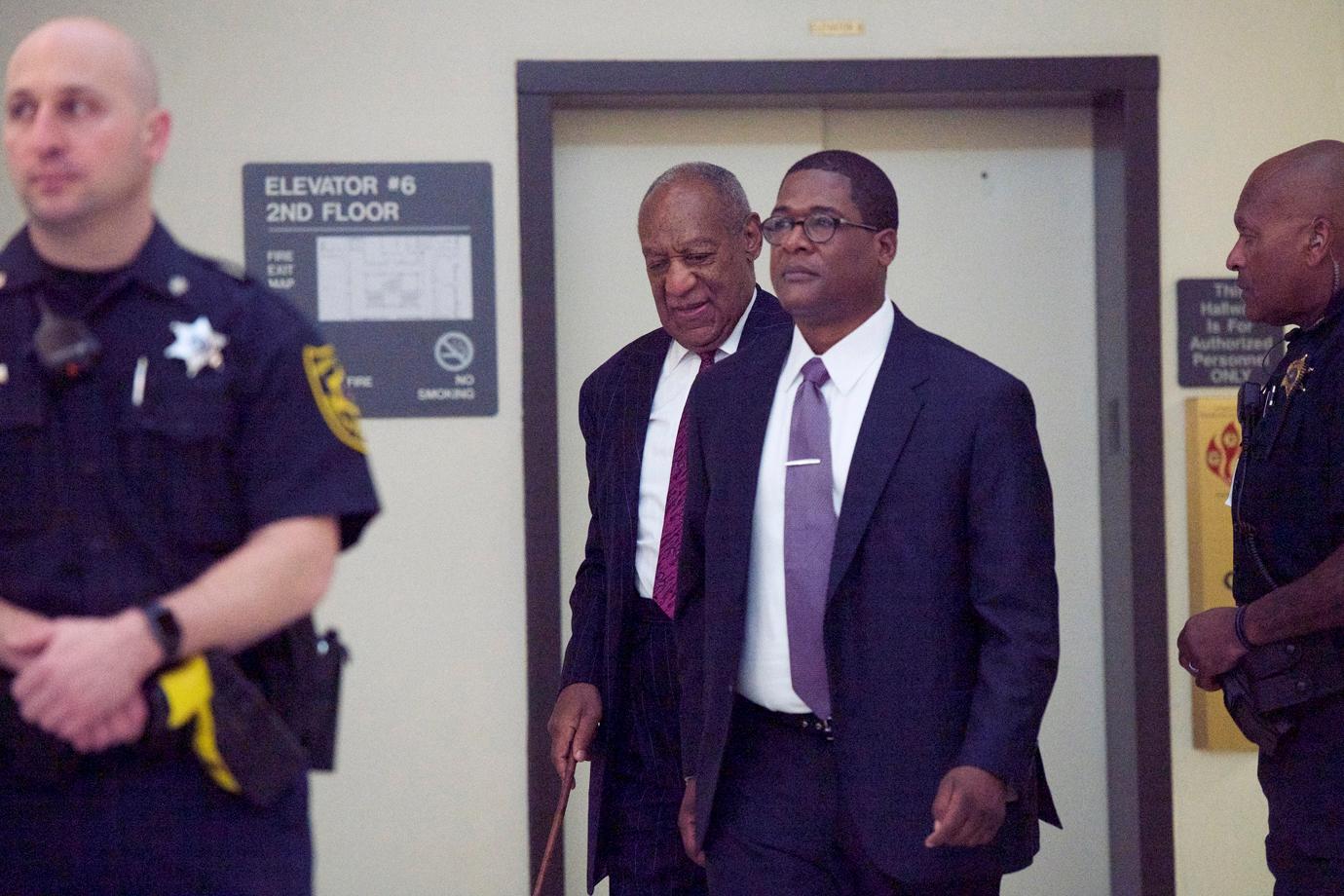 bill cosby handcuffed first photos no bail prison sentence