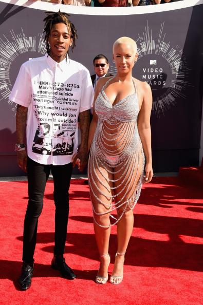 // recording artist wiz khalifa and model amber gettyimages