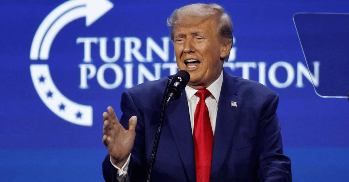 donald trump campaigning from behind the defendants table