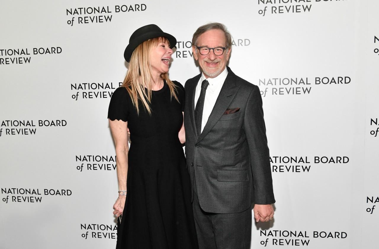 Kate Capshaw smiles at Steven Spielberg on the red carpet