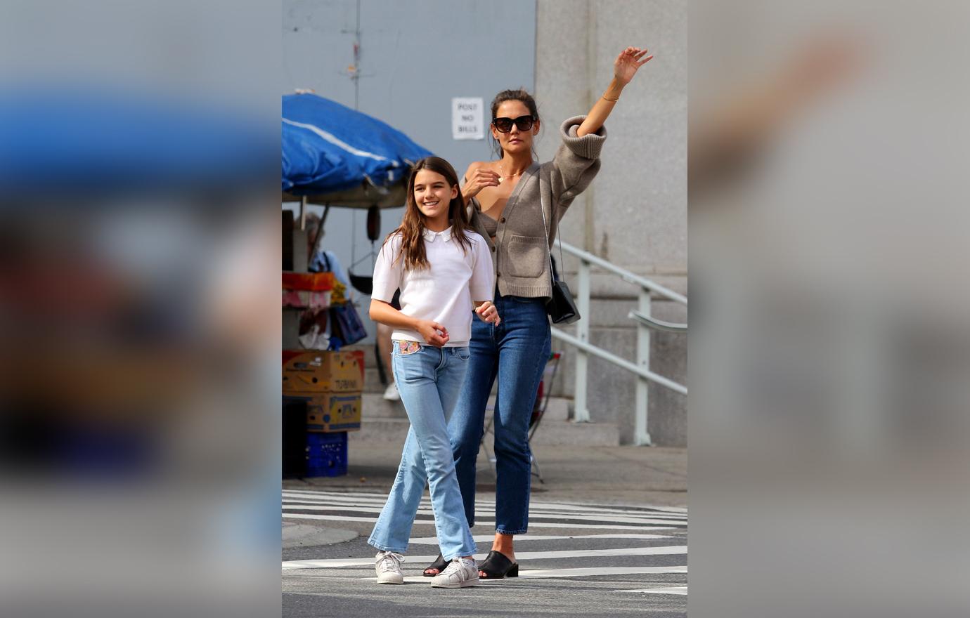 Katie Holmes Flaunts Cleavage in Loose Gray Sweater and Matching Bra Walking With Daughter Suri Cruise