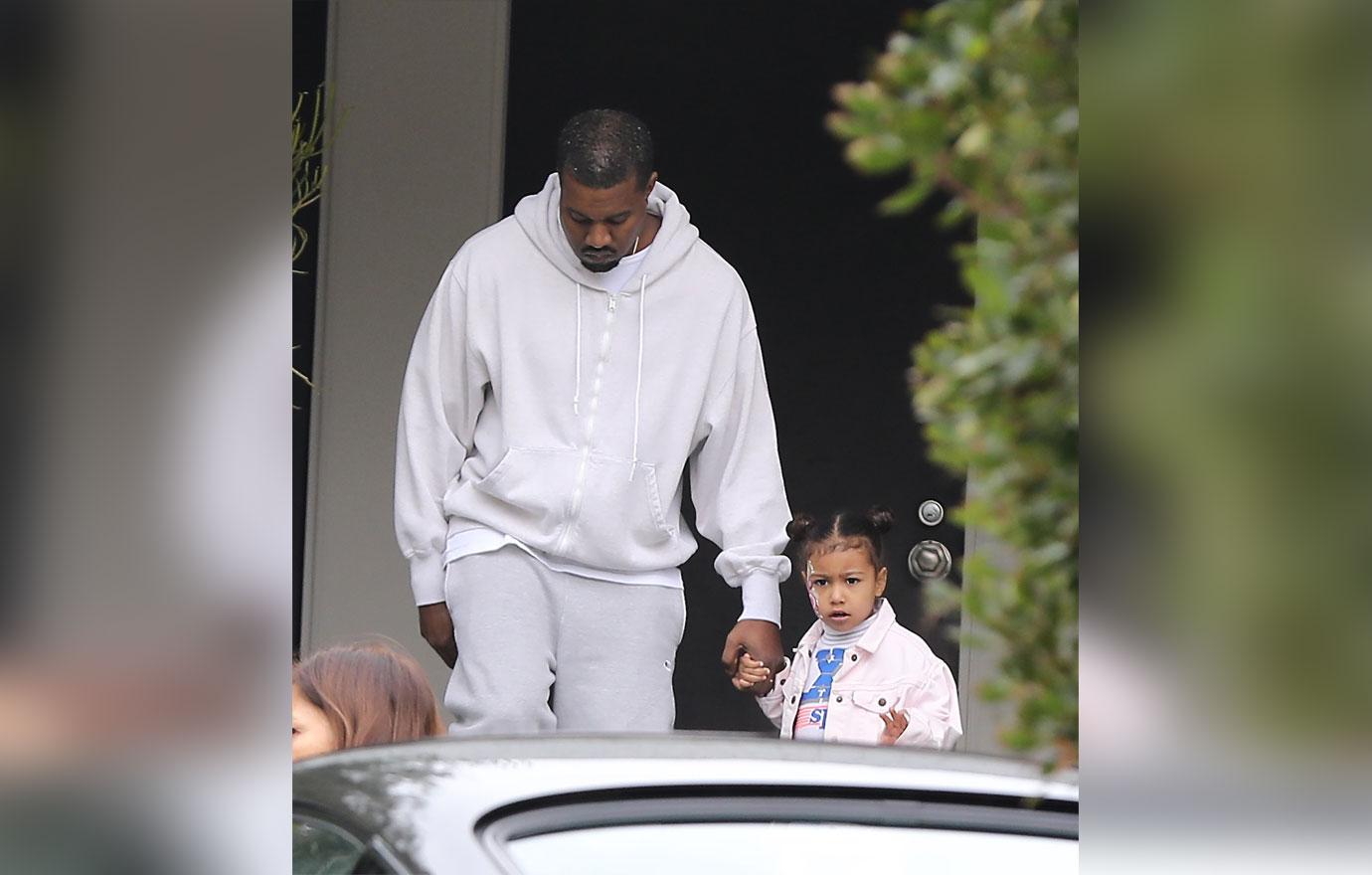 //kanye west kim kardashian divorce rumors kids party pics