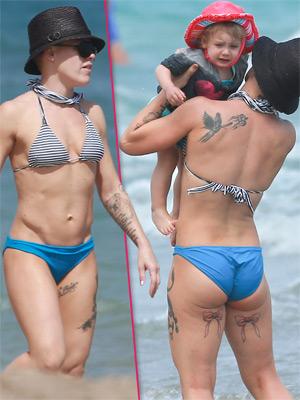 Hot Mama Pink Flaunts Her Toned And Tatted Bikini Body With