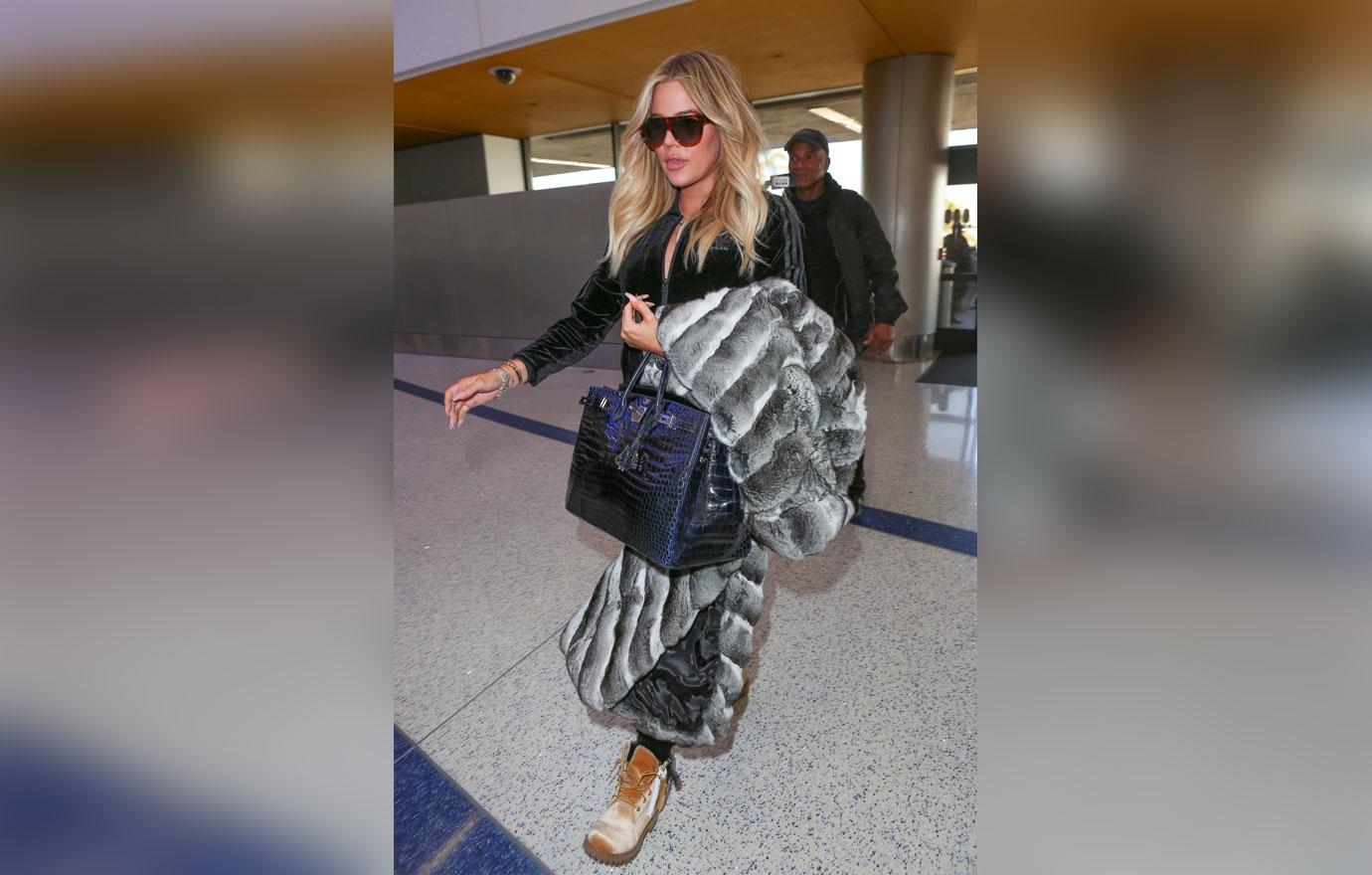 //khloe kardashian flaunts pregnancy curves at lax