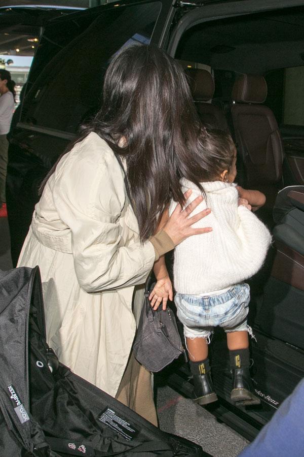 Kim Kardashian Kanye North West Photos -- Toddler Smiles As Family Arrives In Paris