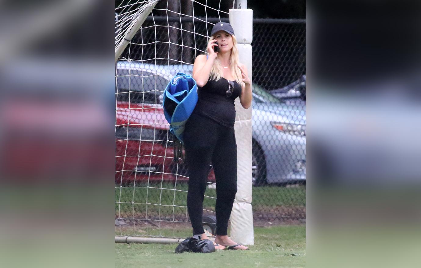 Elin Nordegren Wearing All Black With Pregnant Belly And Talking On The Phone at Her Son's Flag Football Game