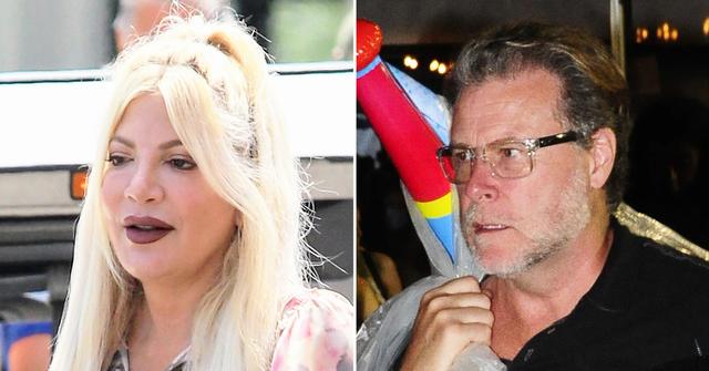 tori spelling dean mcdermott dinner tense photos christmas card divorce