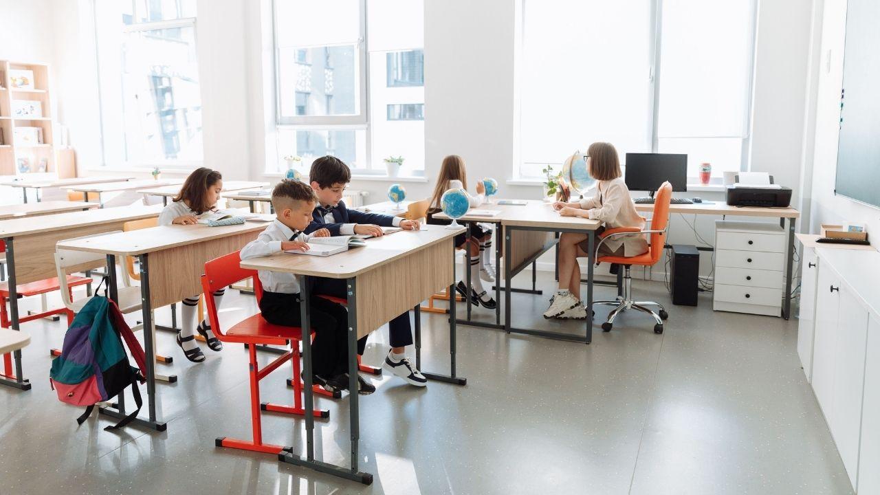 Photo of students and a teacher