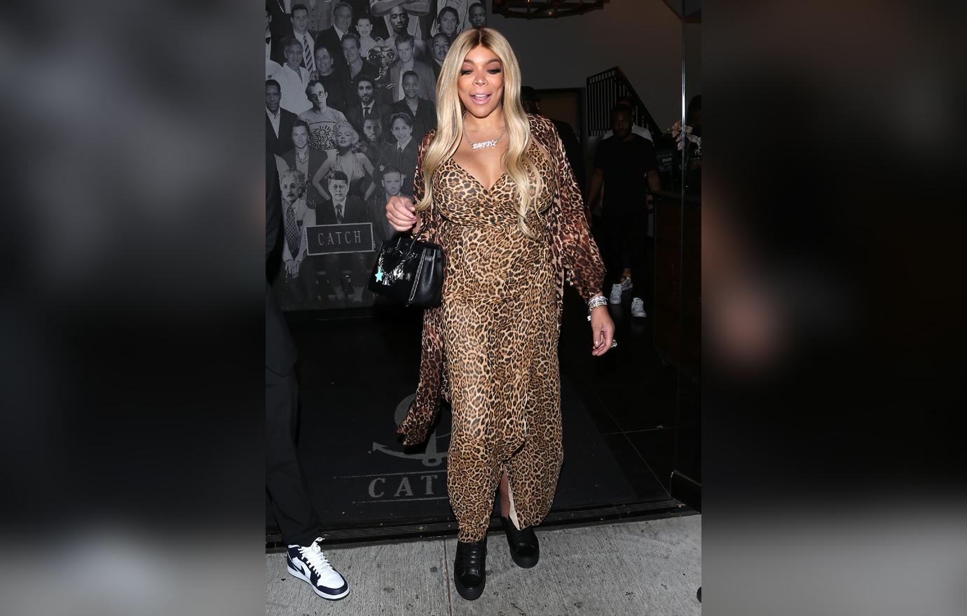 Wendy Williams Dines At Restaurant In Leopard Print Dress