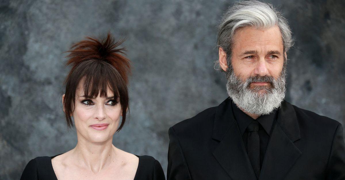 Winona Ryder refuses to walk the aisle after 14 years with Scott Mackinlay, staying committed.