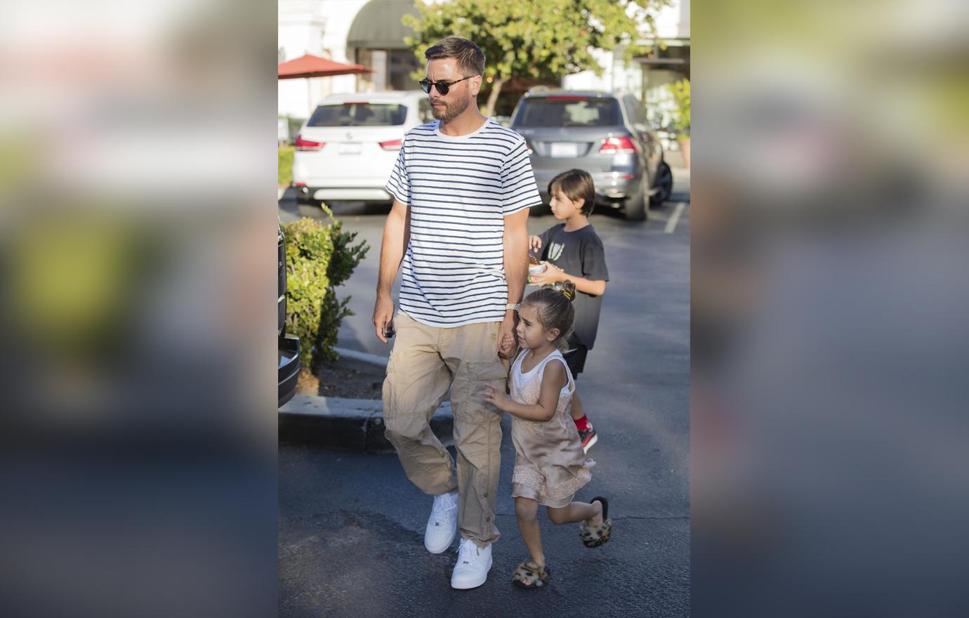 Scott Disick Watches Kids While Kourtney Kardashian Is In Paris