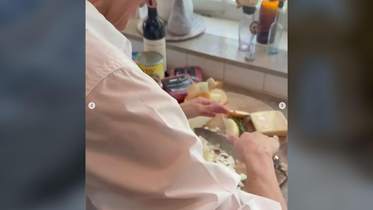 Photo of Meghan Markle chopping onions