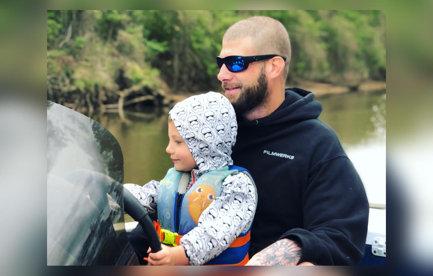 David Eason with Kaden on a jetski.