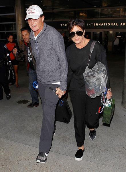 //kris and bruce jenner hold hands