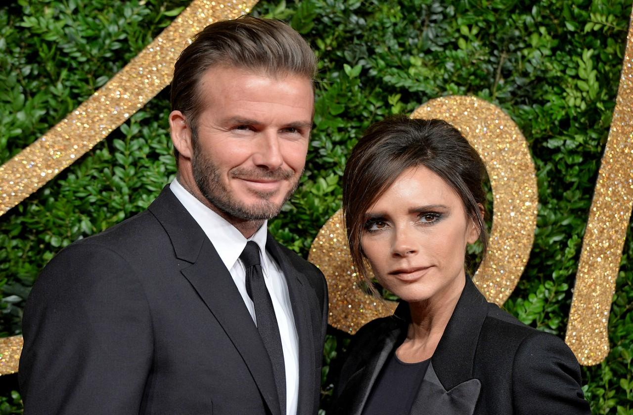 David and Victoria Beckham, dressed in black