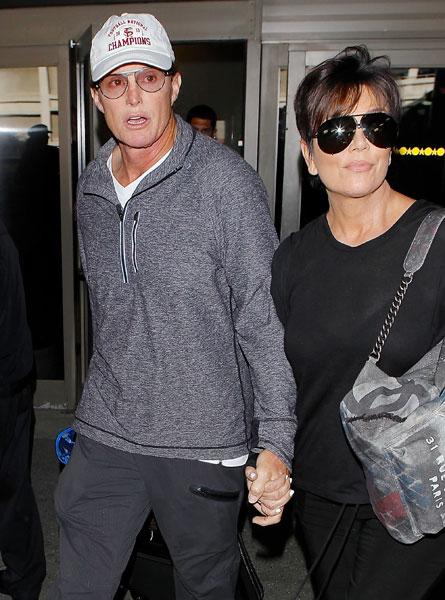 //kris and bruce jenner hold hands